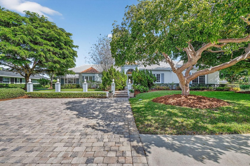 STUNNING Lake Ida home situated on a corner lot with over 1/3 - Beach Home for sale in Delray Beach, Florida on Beachhouse.com