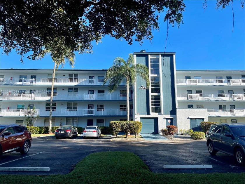 Bright Corner unit with ample view of the golf course, water and - Beach Condo for sale in Margate, Florida on Beachhouse.com
