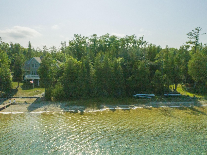 Waterfront property priced to SELL! This wooded lot has 81 feet - Beach Lot for sale in Presque Isle, Michigan on Beachhouse.com