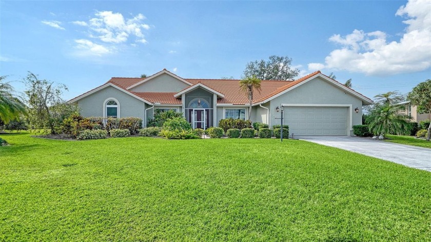 Welcome to this stunning lakefront 4-bedroom, 2-bathroom pool - Beach Home for sale in Venice, Florida on Beachhouse.com