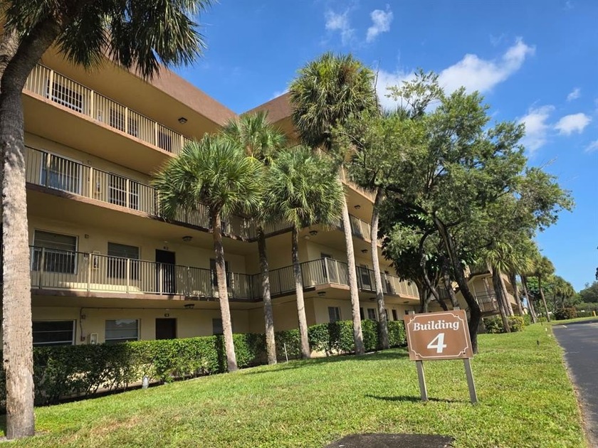 Beautiful First-Floor Condo with Stunning Lake Views! this - Beach Condo for sale in Lauderdale Lakes, Florida on Beachhouse.com