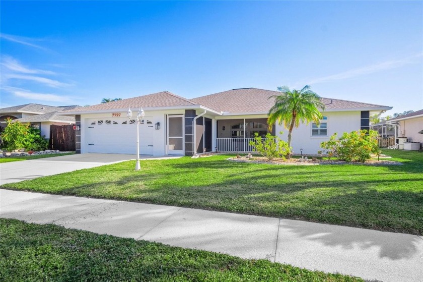 Step into a rare opportunity at 7727 36th Ln E, Sarasota, FL - Beach Home for sale in Sarasota, Florida on Beachhouse.com