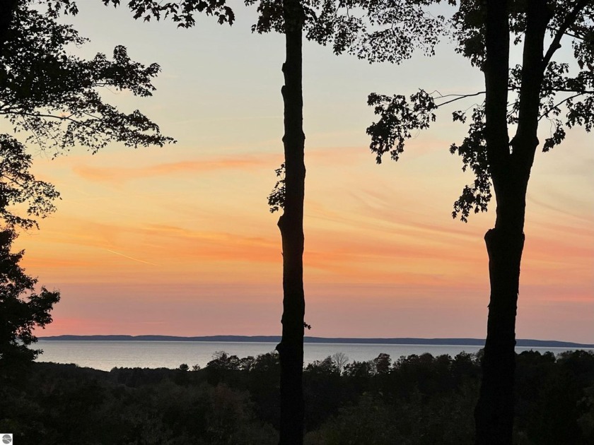Nestled in a serene, wooded setting, this 10.16-acre parcel - Beach Acreage for sale in Northport, Michigan on Beachhouse.com