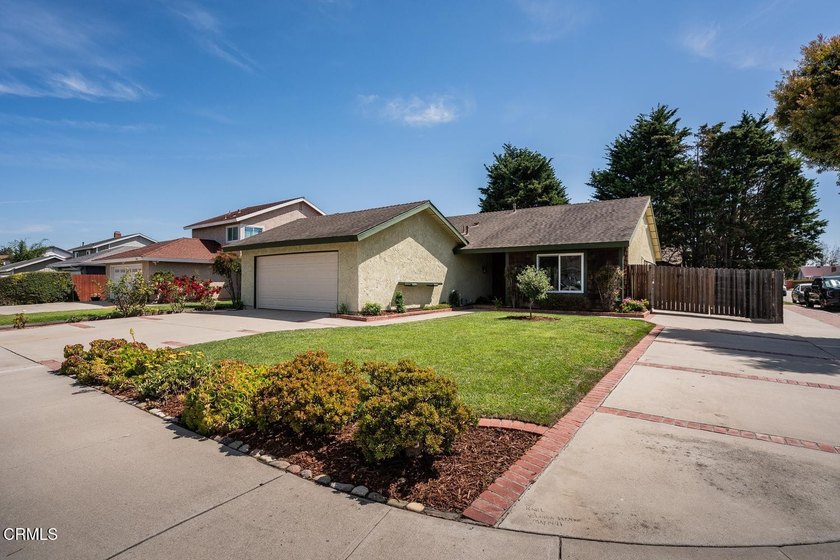 Welcome to this beautifully maintained corner-lot home, ideally - Beach Home for sale in Oxnard, California on Beachhouse.com