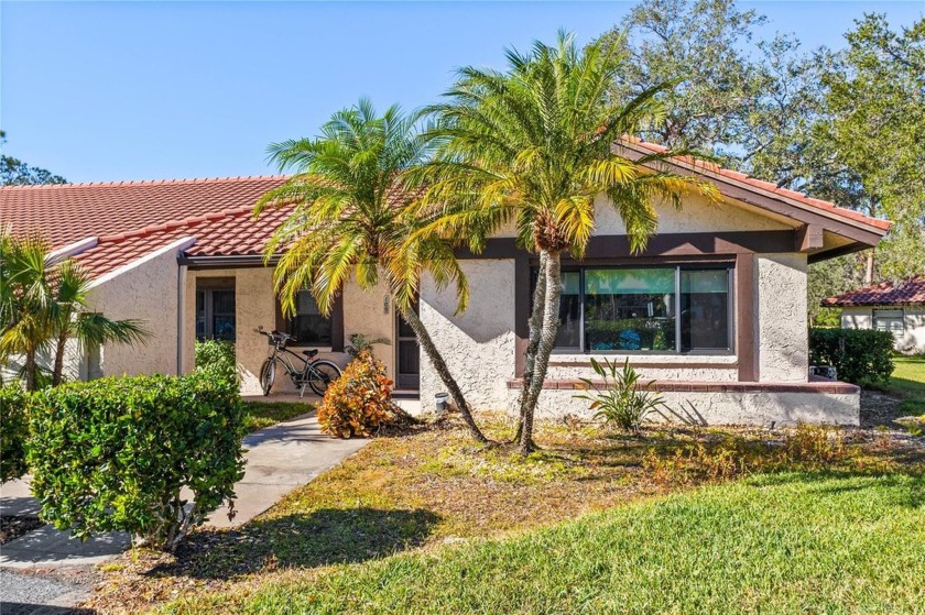 THIS GORGEOUS END UNIT TURN KEY WATER VIEW VILLA HAS BEEN - Beach Home for sale in Sarasota, Florida on Beachhouse.com