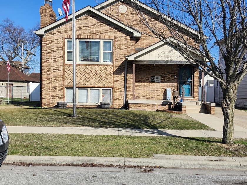 Welcome to this beautiful all-brick home, featuring 3 spacious - Beach Home for sale in Whiting, Indiana on Beachhouse.com