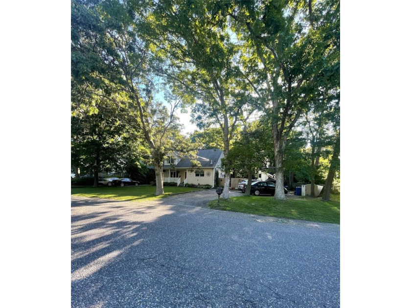 Welcome to a home of exceptional versatility and comfort! This - Beach Home for sale in Shirley, New York on Beachhouse.com