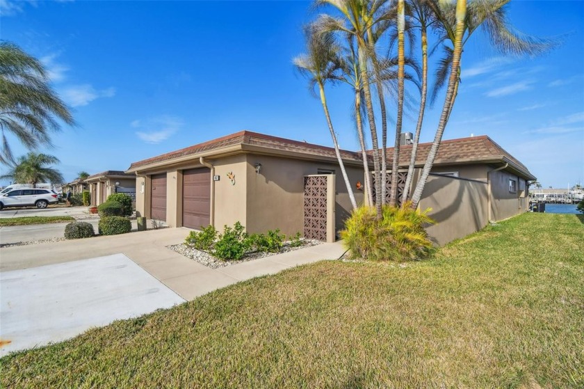 Stunning Waterfront 2-Bedroom Villa in Boca Ciega Point - - Beach Home for sale in St. Petersburg, Florida on Beachhouse.com