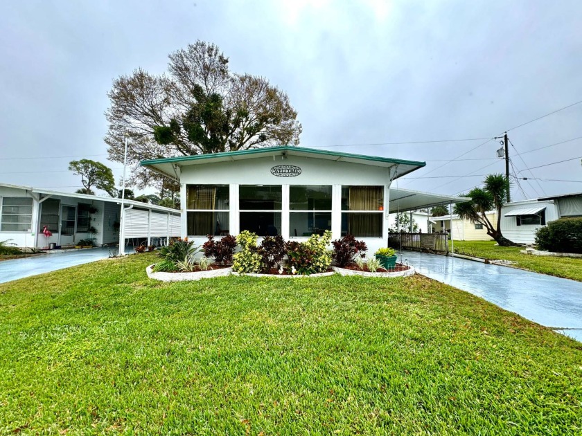 This 1974 Rama home has Ceramic Tile and Laminate flooring - Beach Home for sale in Daytona Beach, Florida on Beachhouse.com