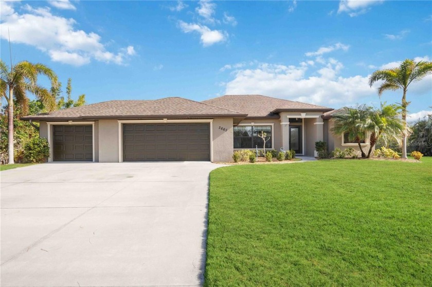 this custom-built 3-bedroom, 2-bath home with a 3-car garage - Beach Home for sale in Englewood, Florida on Beachhouse.com