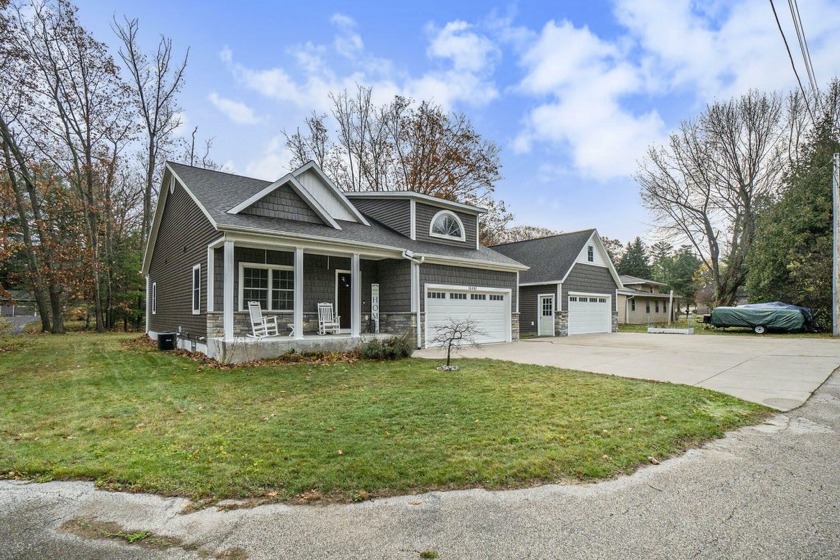 Experience carefree living in this stunning 3 bedroom, 3.5 bath - Beach Home for sale in Spring Lake, Michigan on Beachhouse.com