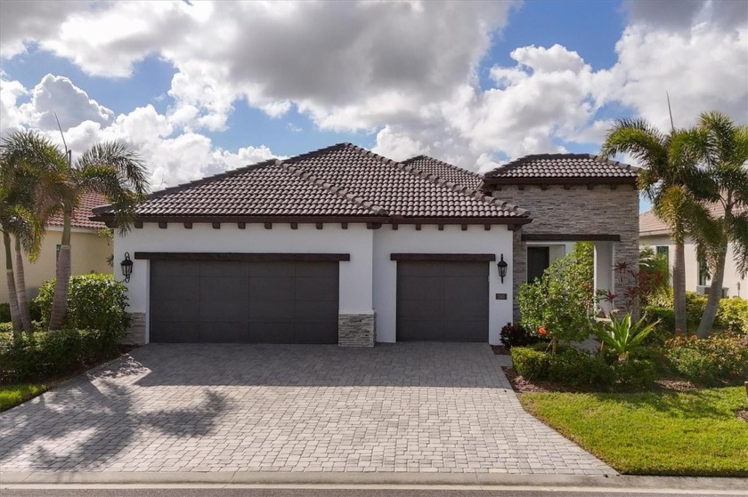 Experience unparalleled luxury in this stunning Neal Signature - Beach Home for sale in Nokomis, Florida on Beachhouse.com