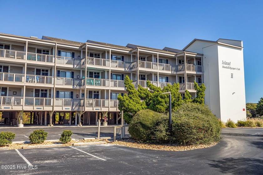 Step into island living w this 3 BR, 2.5 BA condo nestled under - Beach Condo for sale in Atlantic Beach, North Carolina on Beachhouse.com