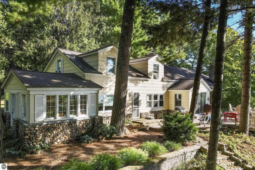 As you drive along East Shore taking in the breathtaking views - Beach Home for sale in Traverse City, Michigan on Beachhouse.com