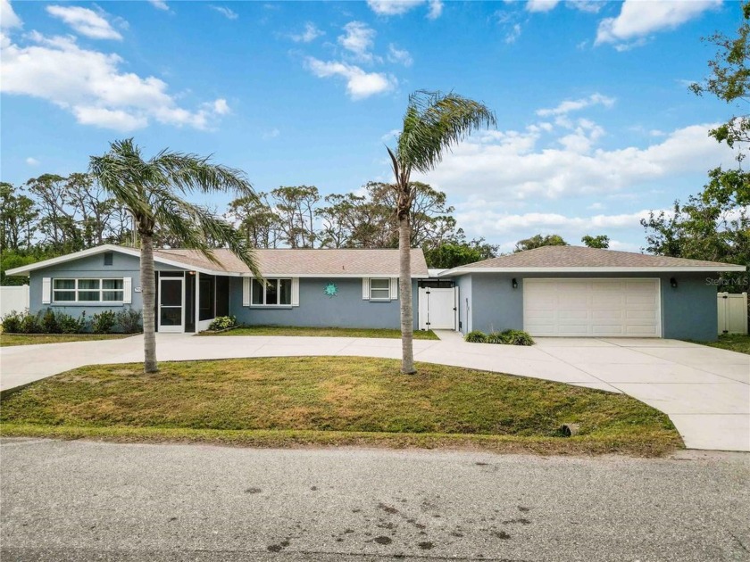 This meticulously maintained 3-bedroom, 2-bath POOL home is MOVE - Beach Home for sale in Venice, Florida on Beachhouse.com