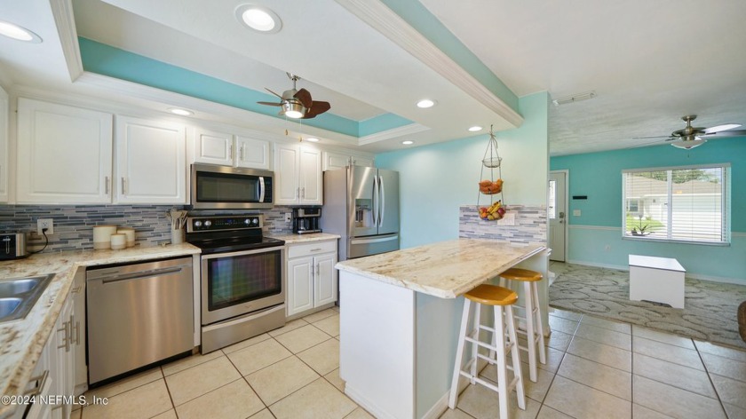 Discover the charm of this meticulously maintained concrete - Beach Home for sale in Palm Coast, Florida on Beachhouse.com