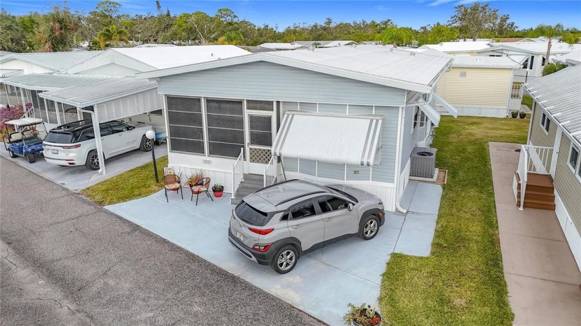 CHARMING 2 BED, 2 BATH MOBILE HOME IN ACTIVE 55+ COMMUNITY. This - Beach Home for sale in Bradenton, Florida on Beachhouse.com