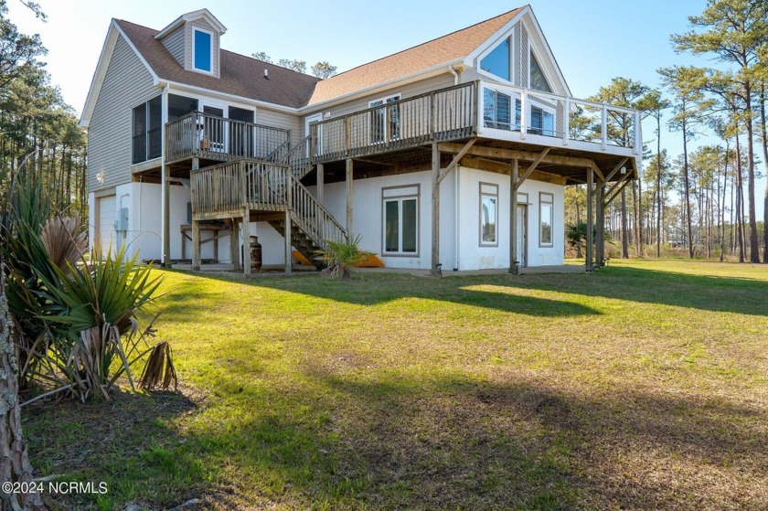 Looking for a vacation home right on the water?  This 4 bedroom - Beach Home for sale in Aurora, North Carolina on Beachhouse.com