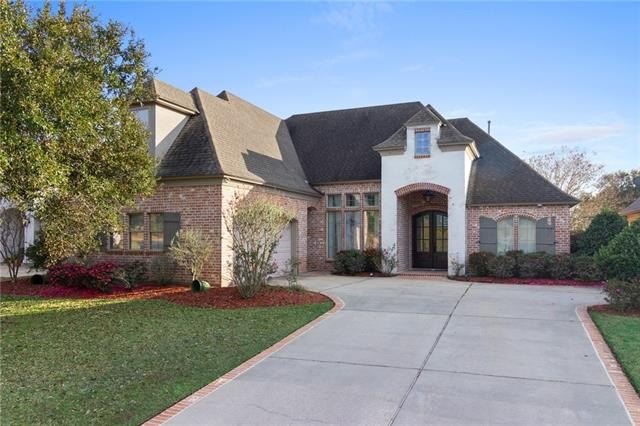 Enjoy serene water and golf course views from this exceptional - Beach Home for sale in Slidell, Louisiana on Beachhouse.com