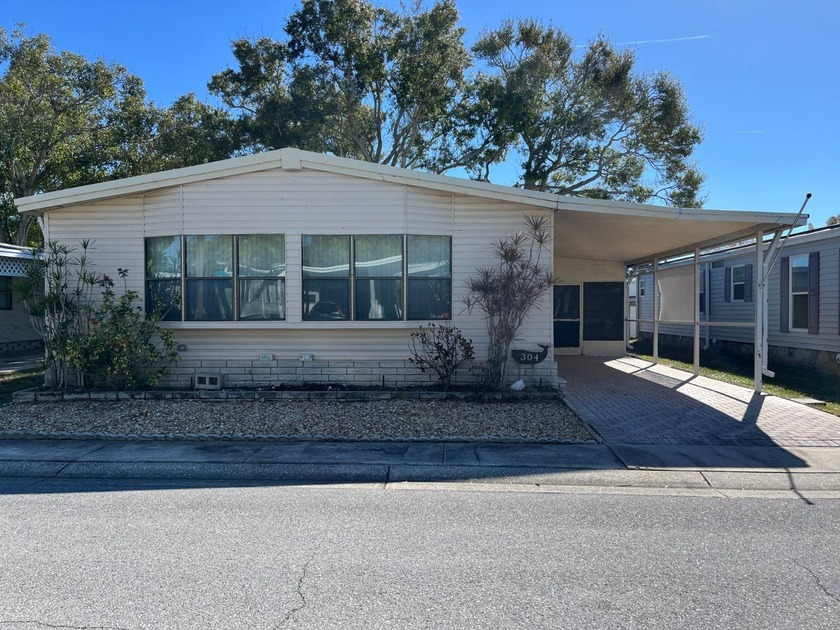 This home needs you! PET FRIENDLY park and loads of potential - Beach Home for sale in Largo, Florida on Beachhouse.com