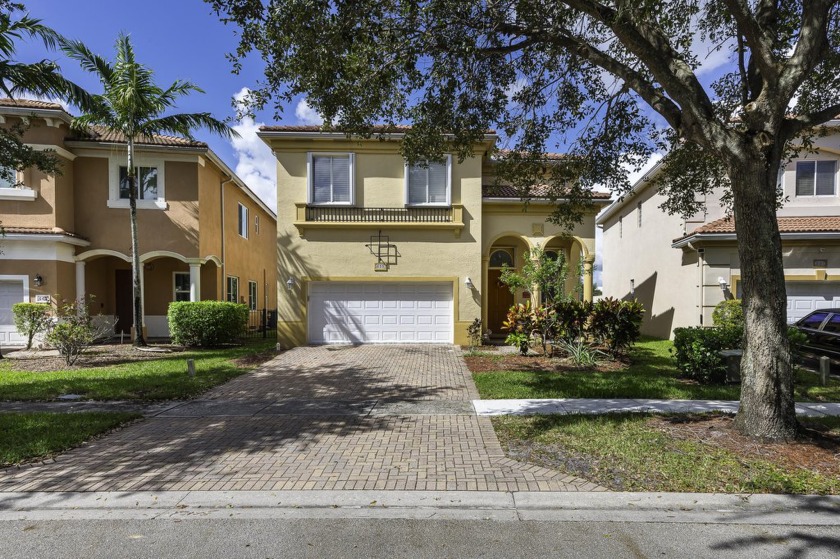 Welcome to 655 Gazetta Way, a beautifully spacious home nestled - Beach Home for sale in West Palm Beach, Florida on Beachhouse.com