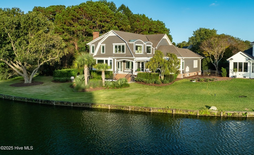 Absolutely magical home overlooking Landfall's largest lake, the - Beach Home for sale in Wilmington, North Carolina on Beachhouse.com