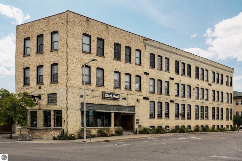 Experience the heart of downtown Traverse City from this - Beach Condo for sale in Traverse City, Michigan on Beachhouse.com