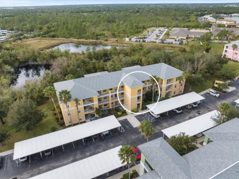 This turnkey furnished second-story condo, featuring two - Beach Condo for sale in Punta Gorda, Florida on Beachhouse.com