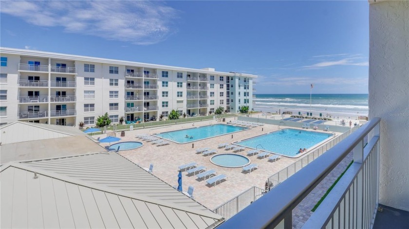 Step into coastal living at its finest with this fully renovated - Beach Condo for sale in New Smyrna Beach, Florida on Beachhouse.com