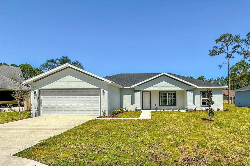 Spectacular Brand New Home Just Completed! Concrete Block - Beach Home for sale in Palm Coast, Florida on Beachhouse.com