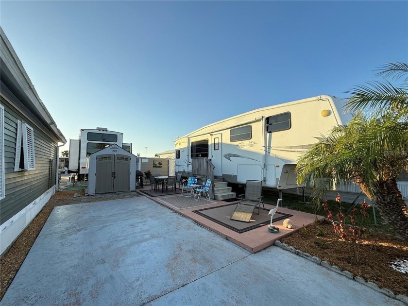 THIS KEYSTONE MONTANA MOUNTAINEER RV ON THIS IDEAL LOT IS - Beach Lot for sale in Englewood, Florida on Beachhouse.com