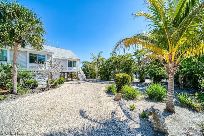 Experience Island living in this stunning elevated duplex - Beach Home for sale in Sanibel, Florida on Beachhouse.com