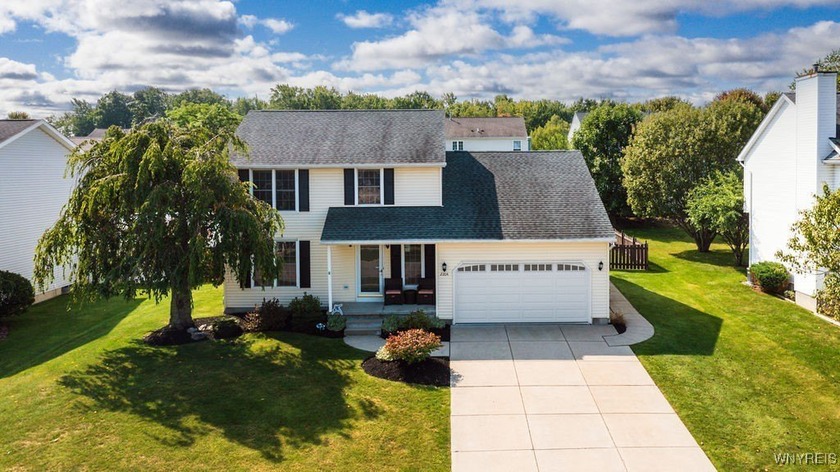 Welcome to 2204 Woodsfield! This 1,915 sq ft home is move-in - Beach Home for sale in Hamburg, New York on Beachhouse.com