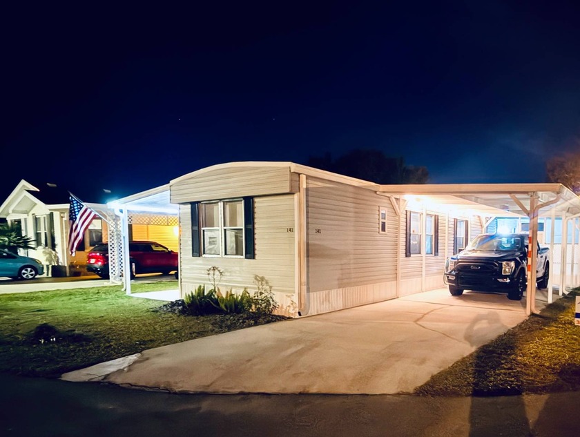 Welcome to this lovely corner-unit home, beautifully maintained - Beach Home for sale in New Smyrna Beach, Florida on Beachhouse.com