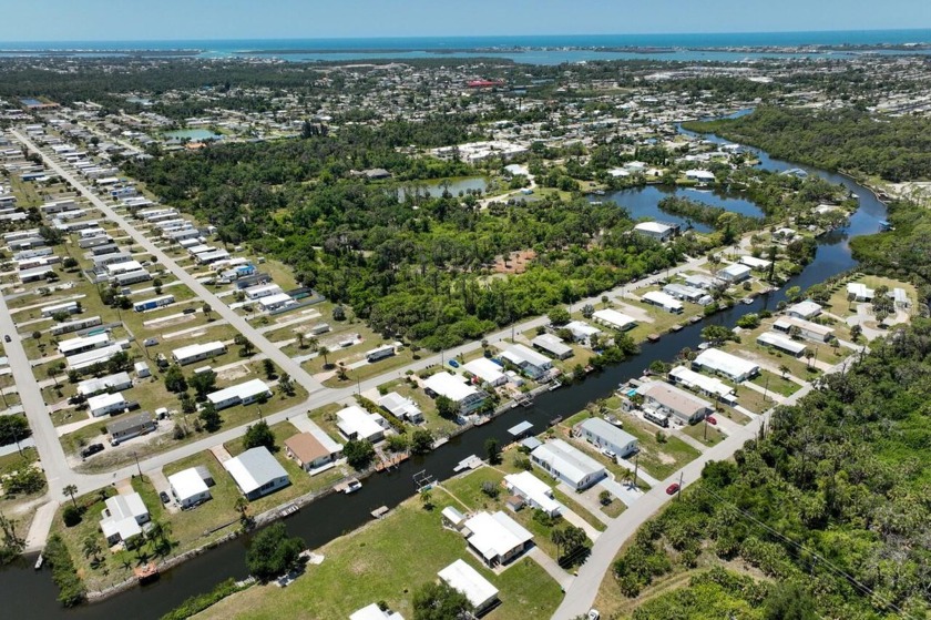 This mobile home, with Gulf of Mexico access, is situated on an - Beach Home for sale in Englewood, Florida on Beachhouse.com
