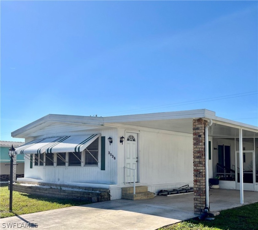 GORGEOUS HOME IN 55+ LAKE ARROWHEAD MOBILE HOME COMMUNITY WHERE - Beach Home for sale in North Fort Myers, Florida on Beachhouse.com