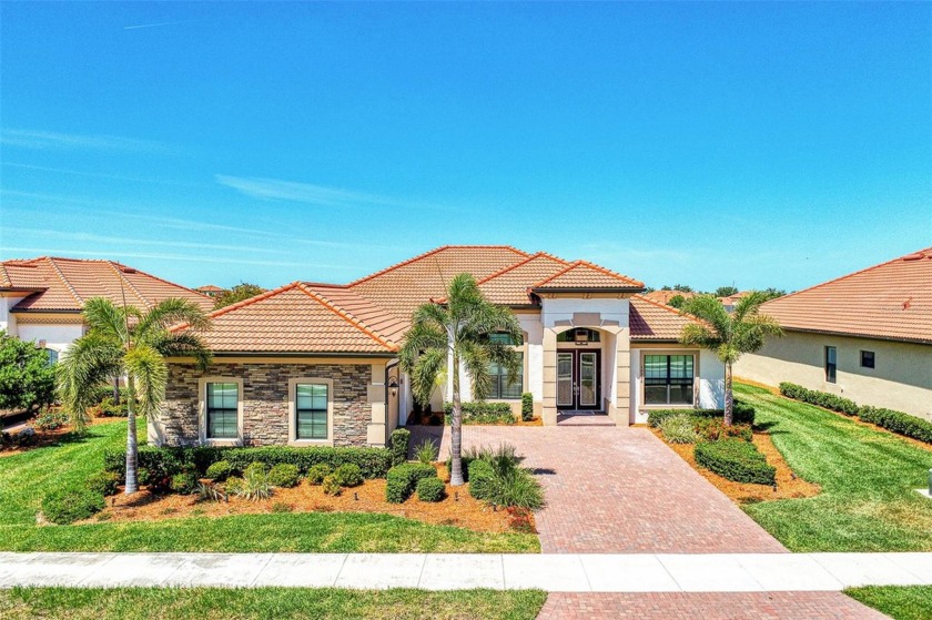 WWelcome to 10908 Tarflower Drive - The Epitome of Elegance in - Beach Home for sale in Venice, Florida on Beachhouse.com