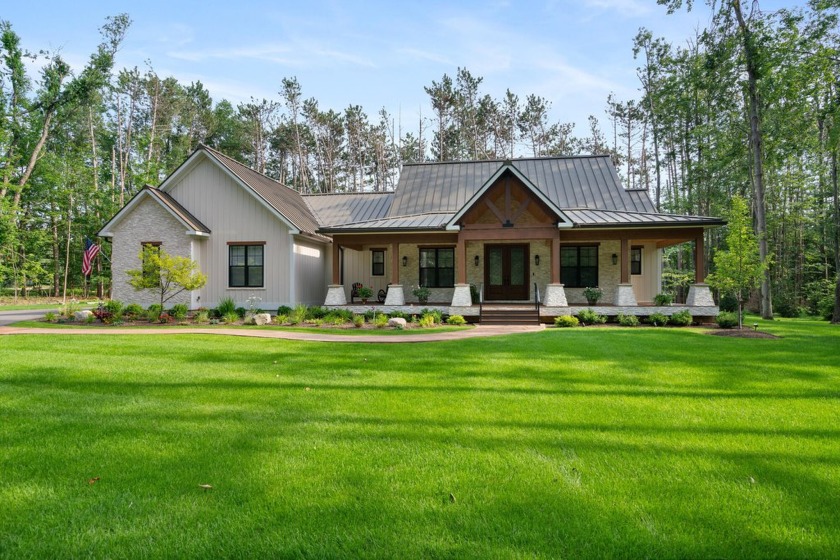 Perfectly situated along the fairways, this stunning new build - Beach Home for sale in Harbor Springs, Michigan on Beachhouse.com