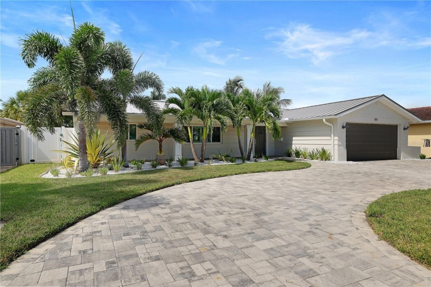 Completely remodeled waterfront beach home in the highly sought - Beach Home for sale in ST Pete Beach, Florida on Beachhouse.com