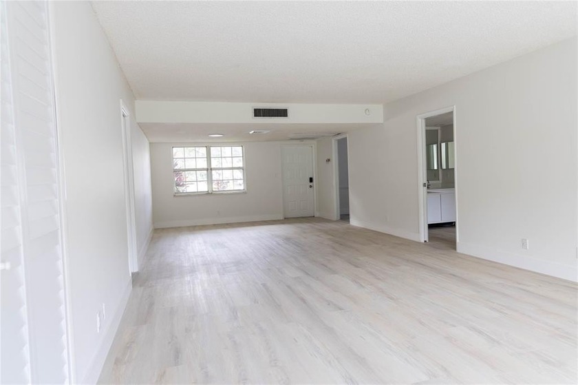Take a look at this beautiful condo in Palm Aire with new floors - Beach Condo for sale in Pompano Beach, Florida on Beachhouse.com