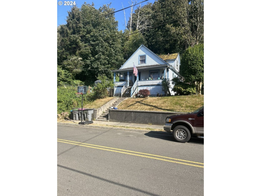 Nestled in the heart of the historic Union Town of Astoria, this - Beach Home for sale in Astoria, Oregon on Beachhouse.com