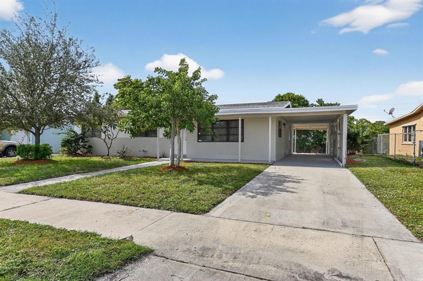 Welcome to 115 N 11th St, a beautifully renovated home just - Beach Home for sale in Lantana, Florida on Beachhouse.com