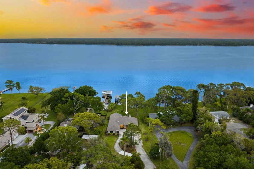 Nestled on the sun-drenched shores of Palm Harbor's Lake Tarpon - Beach Home for sale in Tarpon Springs, Florida on Beachhouse.com