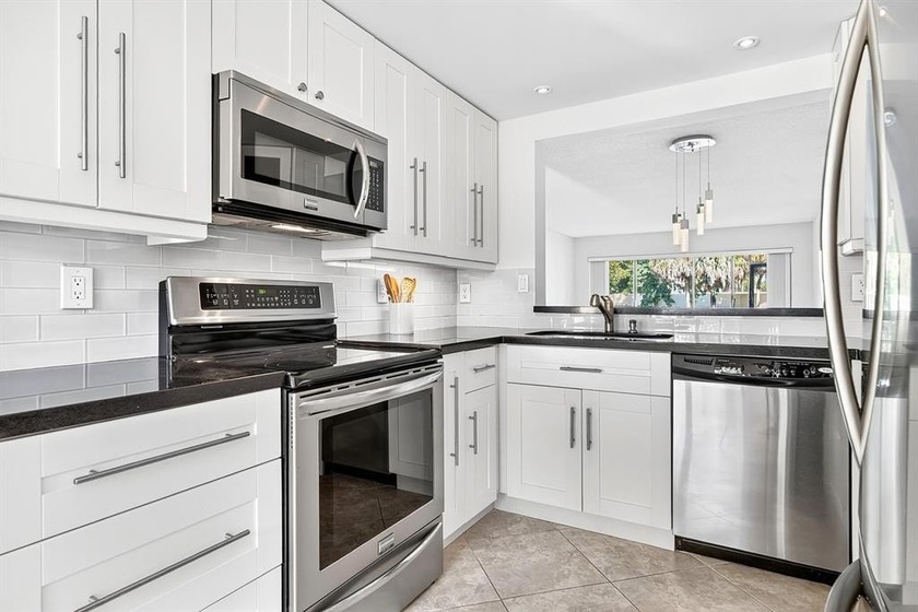 Boca Delray Golf & Country Club - a premier 55+ gated community - Beach Condo for sale in Delray Beach, Florida on Beachhouse.com