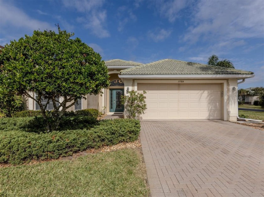 This beautifully maintained, 1,942-square-foot home that offers - Beach Home for sale in Venice, Florida on Beachhouse.com