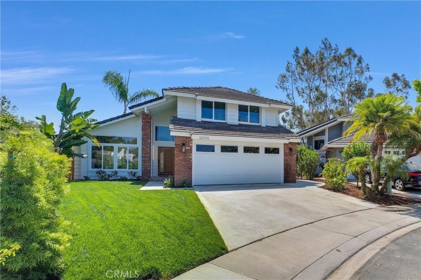 Nestled in the desirable neighborhood of Dana Woods, this - Beach Home for sale in Dana Point, California on Beachhouse.com