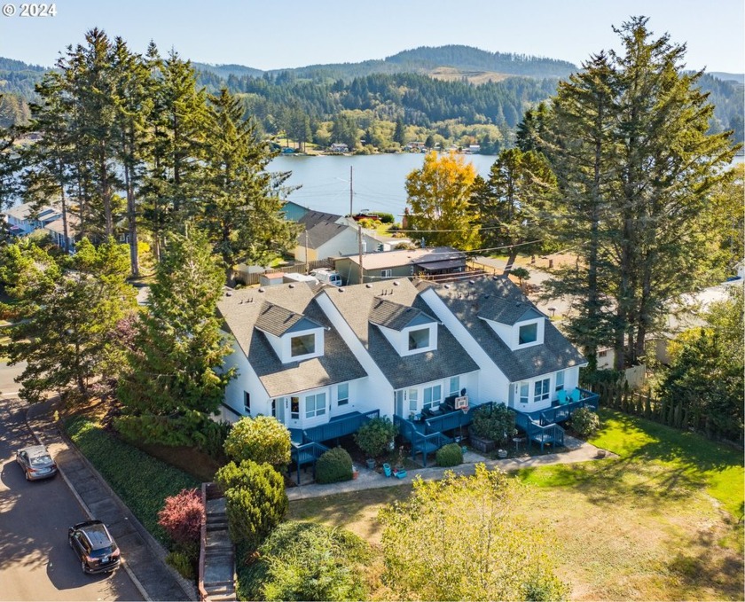 Income-Producing Tri-Plex with Lake Views in Highly Desirable - Beach Lot for sale in Neotsu, Oregon on Beachhouse.com