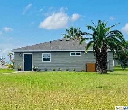 This cozy and beautiful cottage is located on the canal front - Beach Home for sale in Rockport, Texas on Beachhouse.com