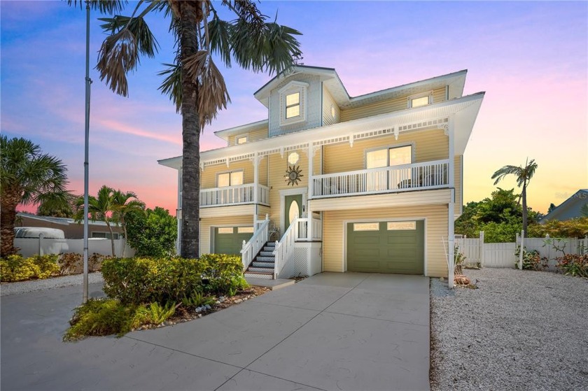 This custom built home is full of Southern charm and looks like - Beach Home for sale in Holmes Beach, Florida on Beachhouse.com