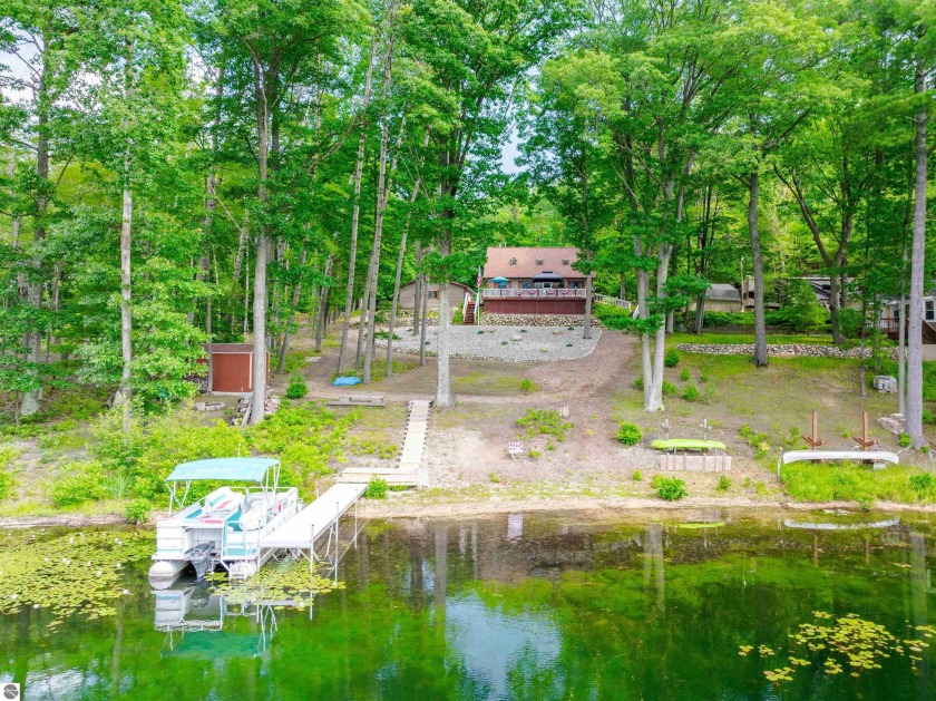 Lake Living with 102 feet of direct frontage on beautiful - Beach Home for sale in Traverse City, Michigan on Beachhouse.com